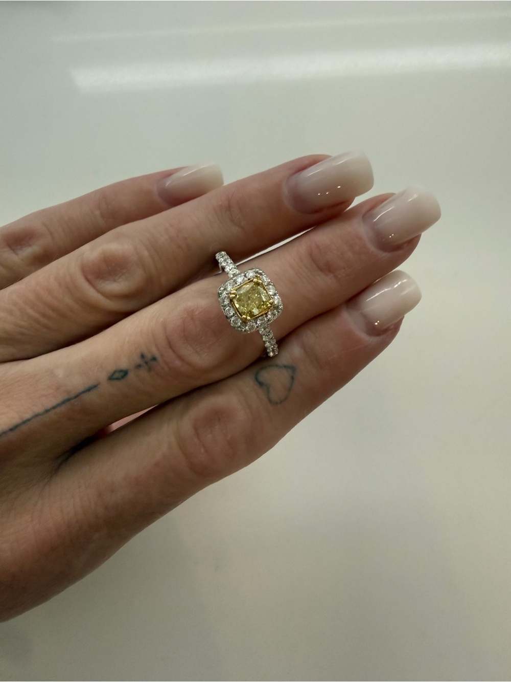 Yellow Diamond Halo Engagement Ring in White Gold